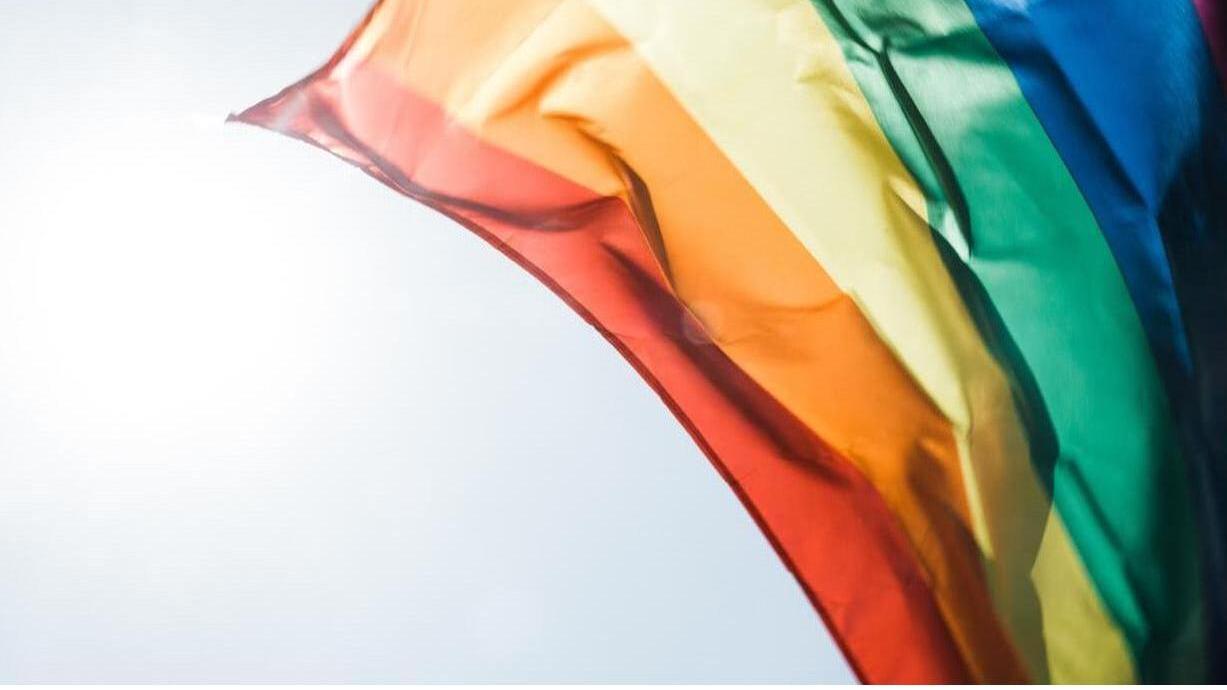 Rainbowflag as a Symbol for the Decision of the 34th Assembly of the Lesbian and Gay Federation &quot;Self-determined, the way we are&quot;